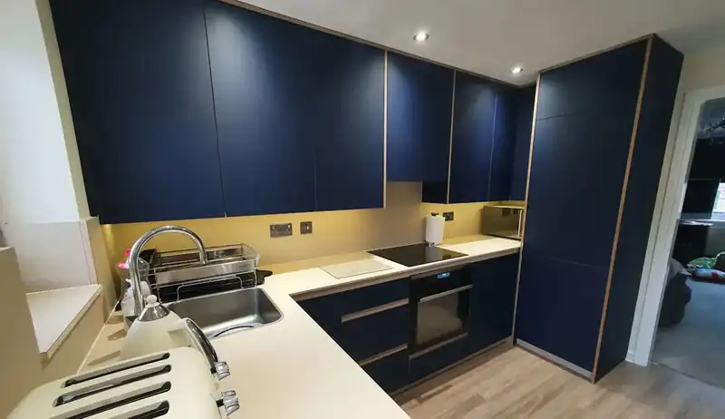 Completed Blue FENIX plywood kitchen by JS DECO in Wakefield