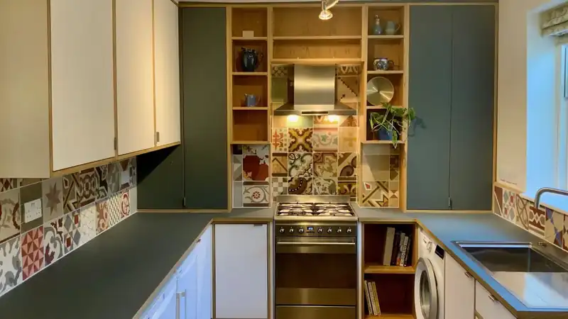 Completed Green FENIX and oak veneer kitchen by JS DECO in Stroud, Gloucestershire