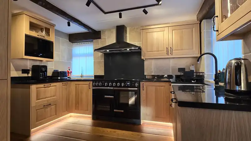 Traditional solid oak bespoke kitchen with granite worktops in Huddersfield