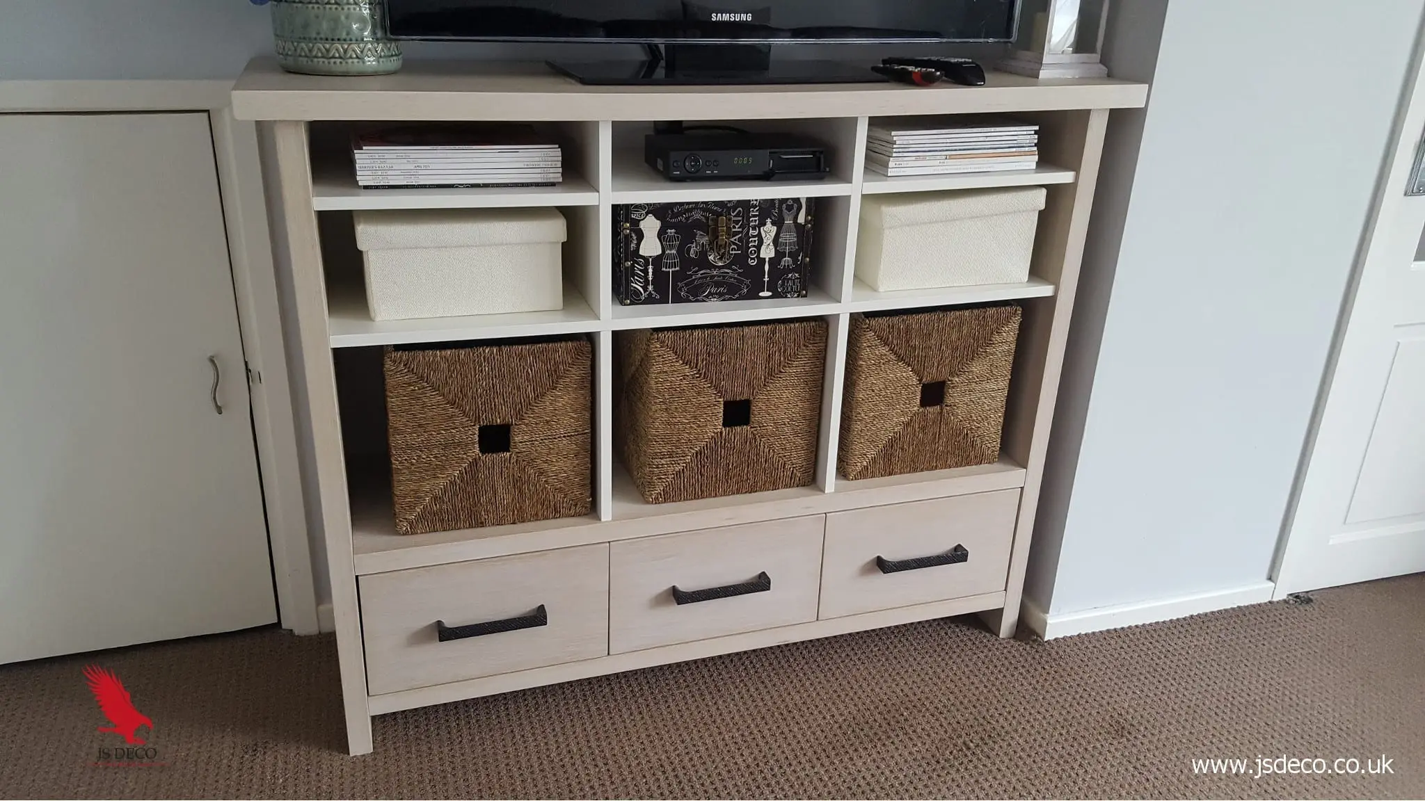 Bespoke oak veneer TV unit with storage baskets and drawers handmade in West Yorkshire