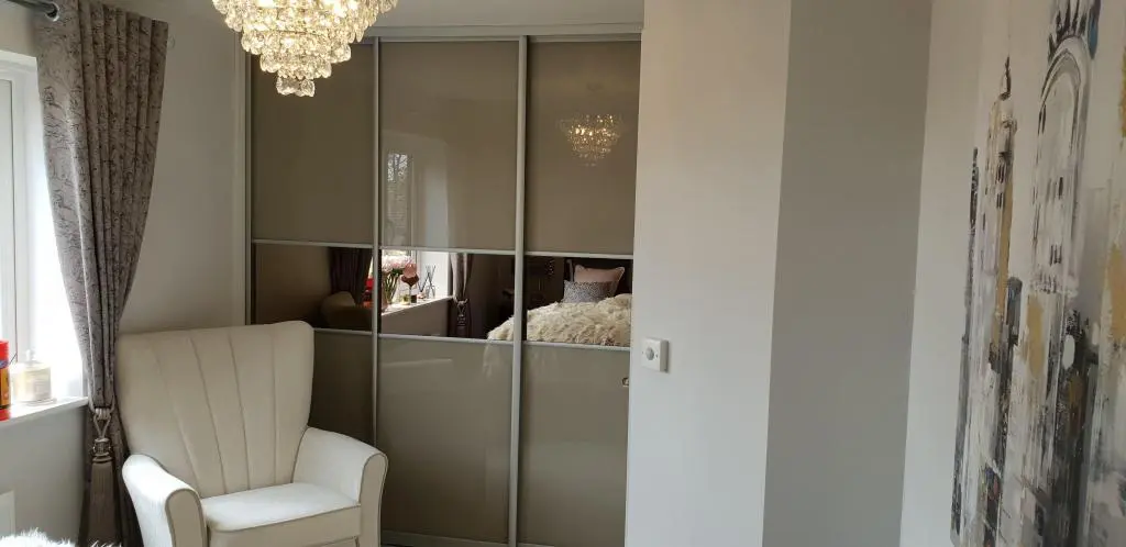 High gloss sliding door wardrobe