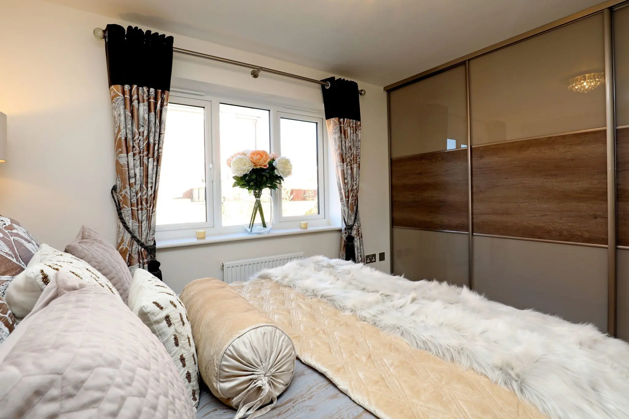 High gloss sliding door wardrobe.