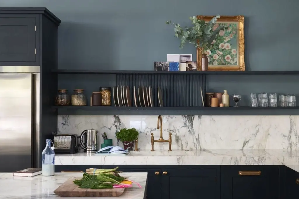 Stylish kitchen with marble countertop.