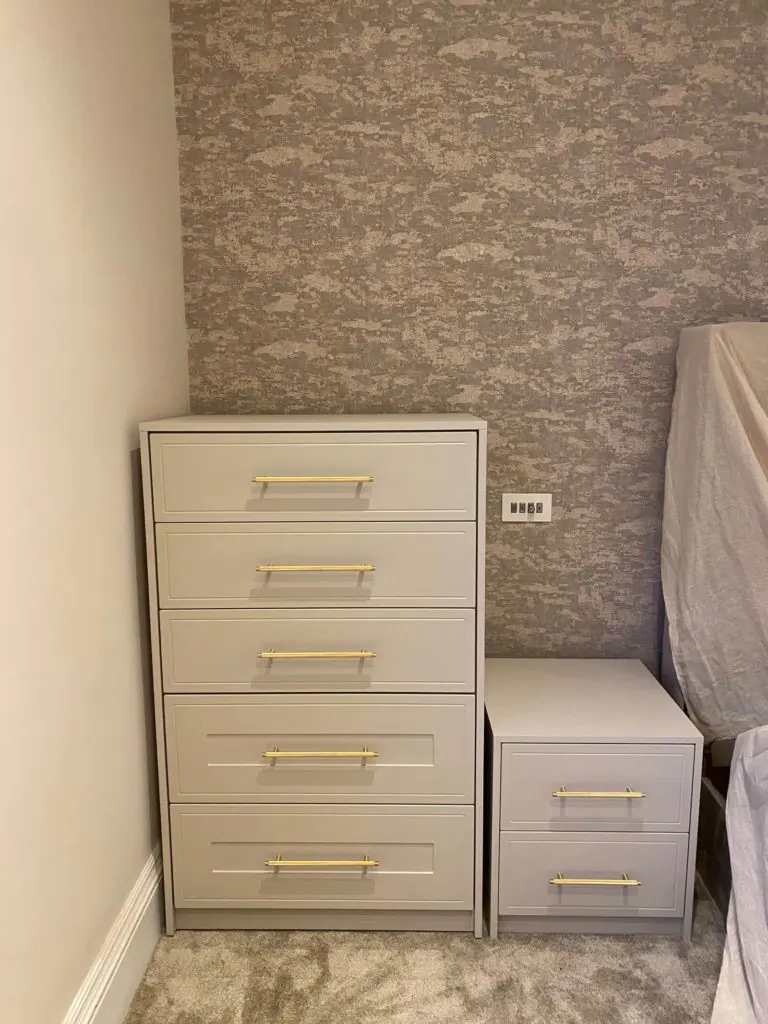 Matching cashmere chest of drawers and bedside cabinet with gold-effect handles