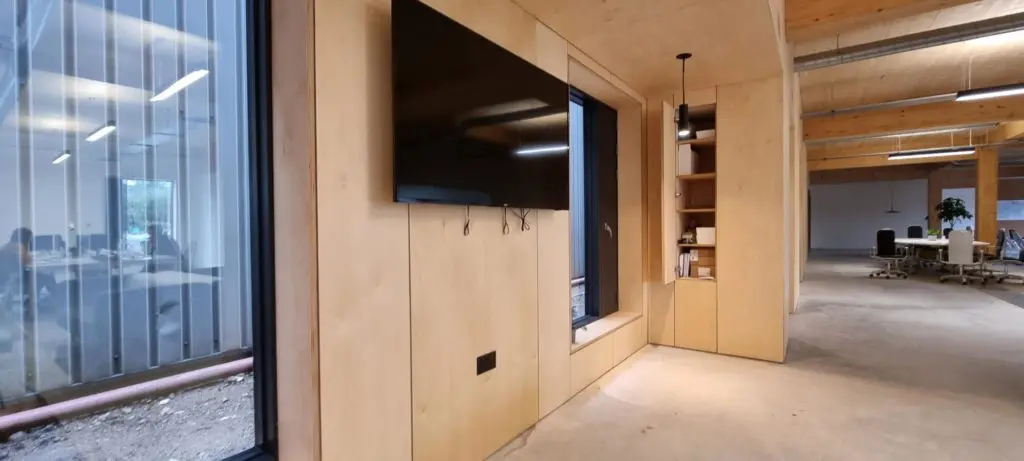 Commercial office furniture integrated into the CITU service wall.
