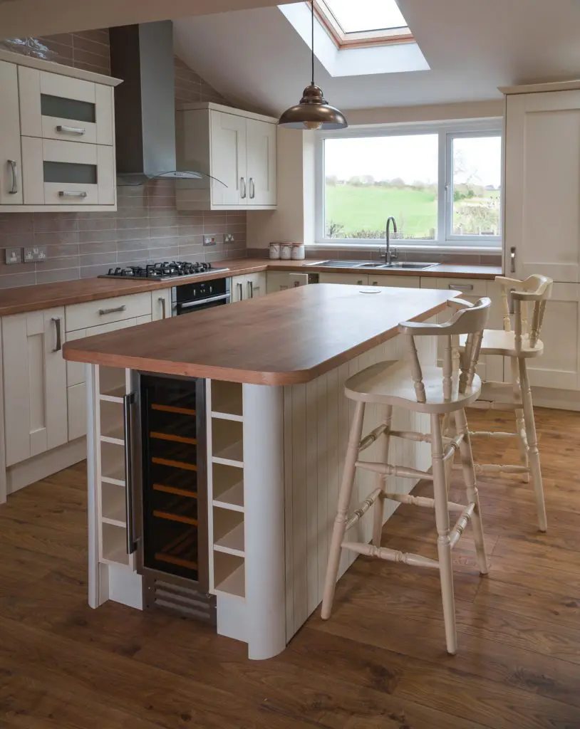 Hand painted traditional style ivory colour kitchen with island