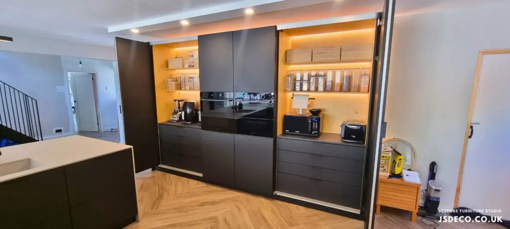 Manchester FENIX kitchen with bifold cabinetry