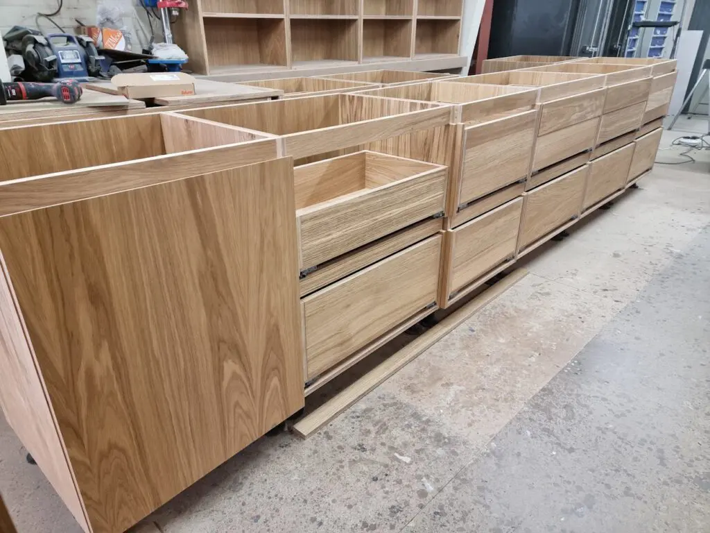 Oak-veneered plywood cabinet carcases assembled in the JS DECO workshop