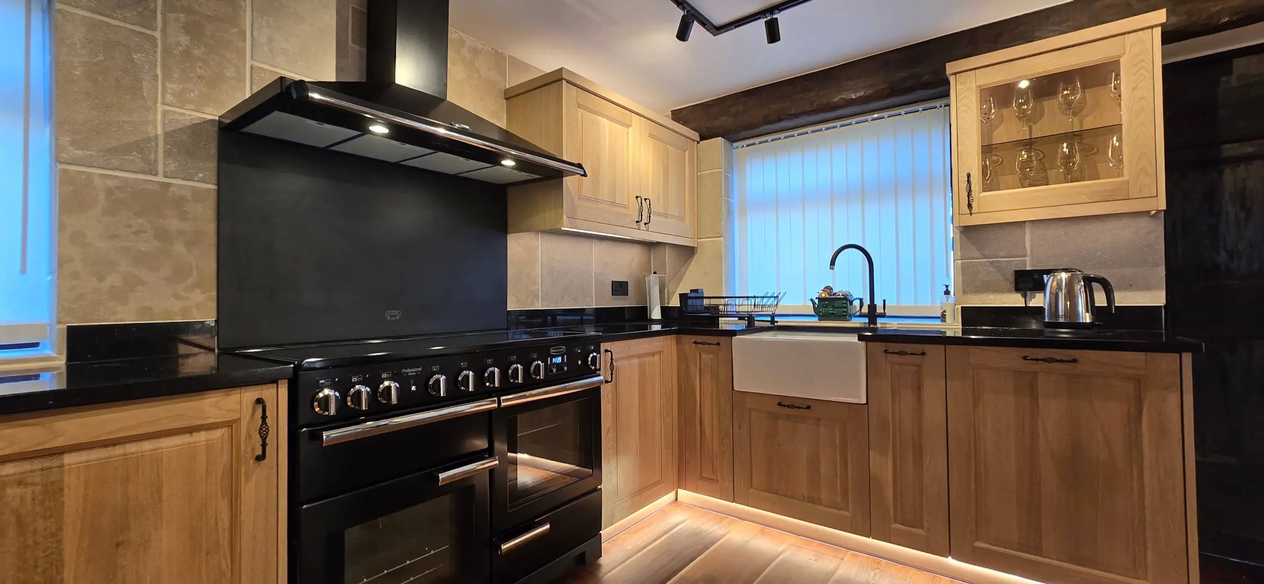 Traditional style kitchen with hand made oak ogee doors and Rangemaster cooker in Huddersfield