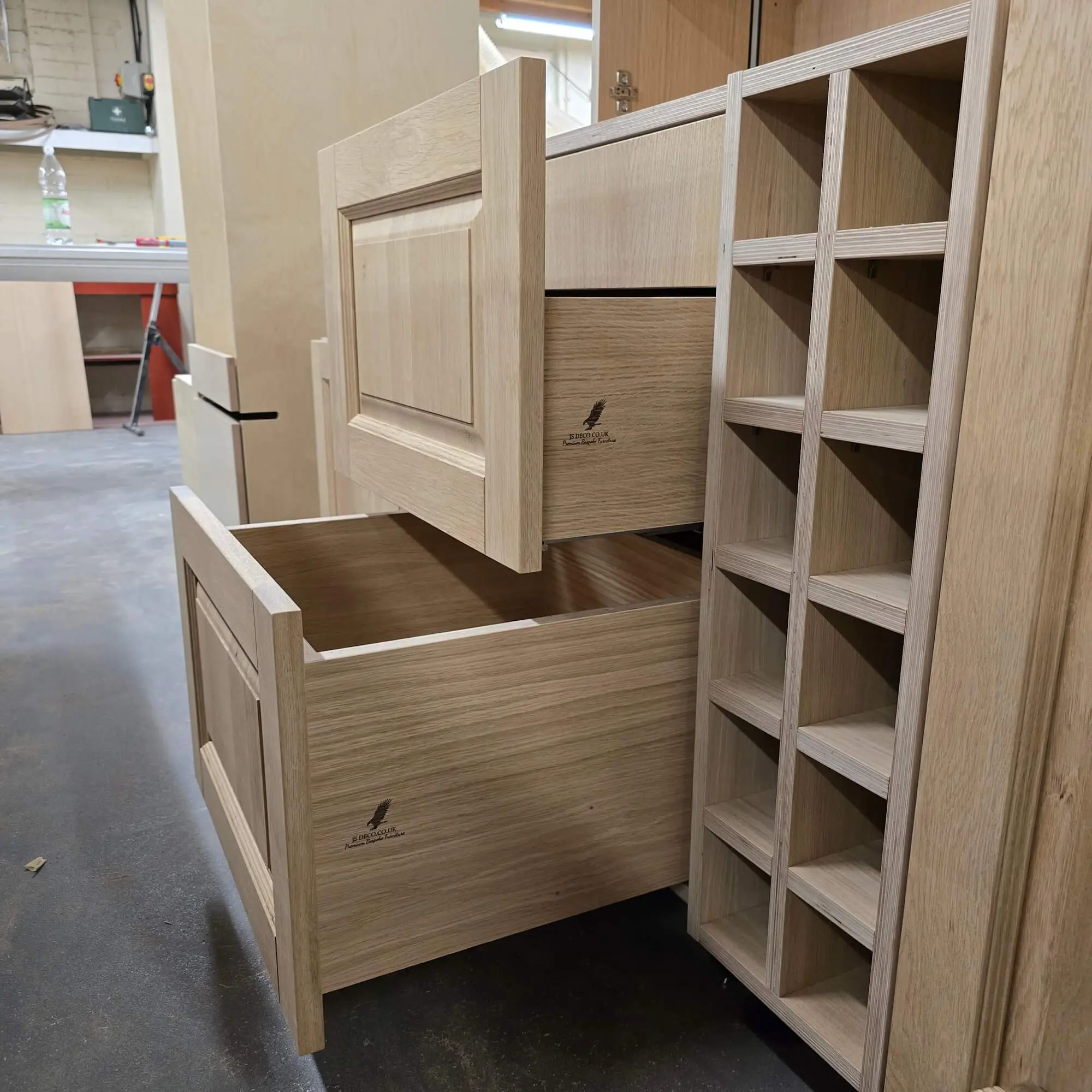 Hand made solid oak kitchen cabinets under construction in JS DECO workshop showing drawer boxes