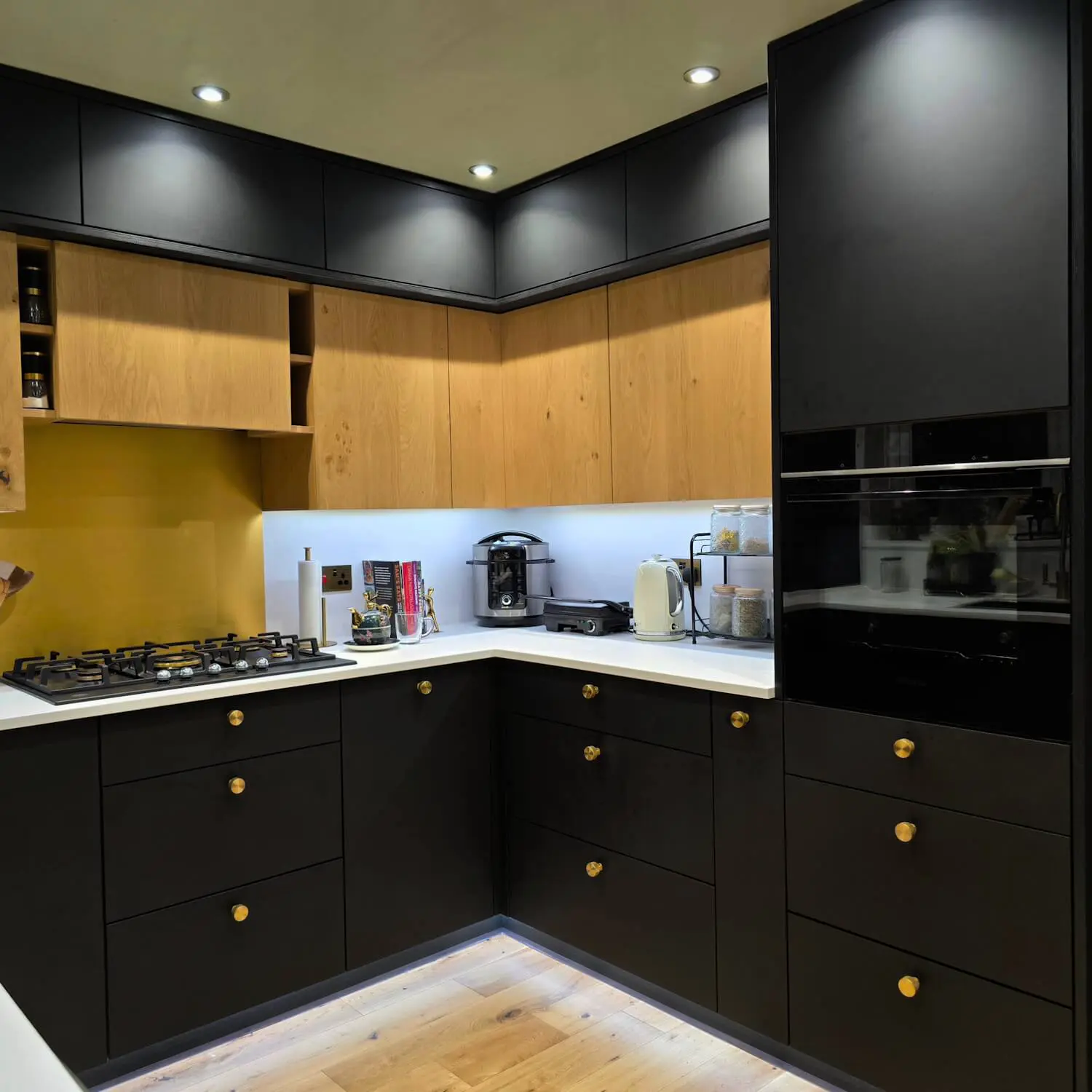 Bespoke oak and black matte kitchen by JS DECO, designed and handcrafted in the UK to combine precision, warmth, and modern elegance.