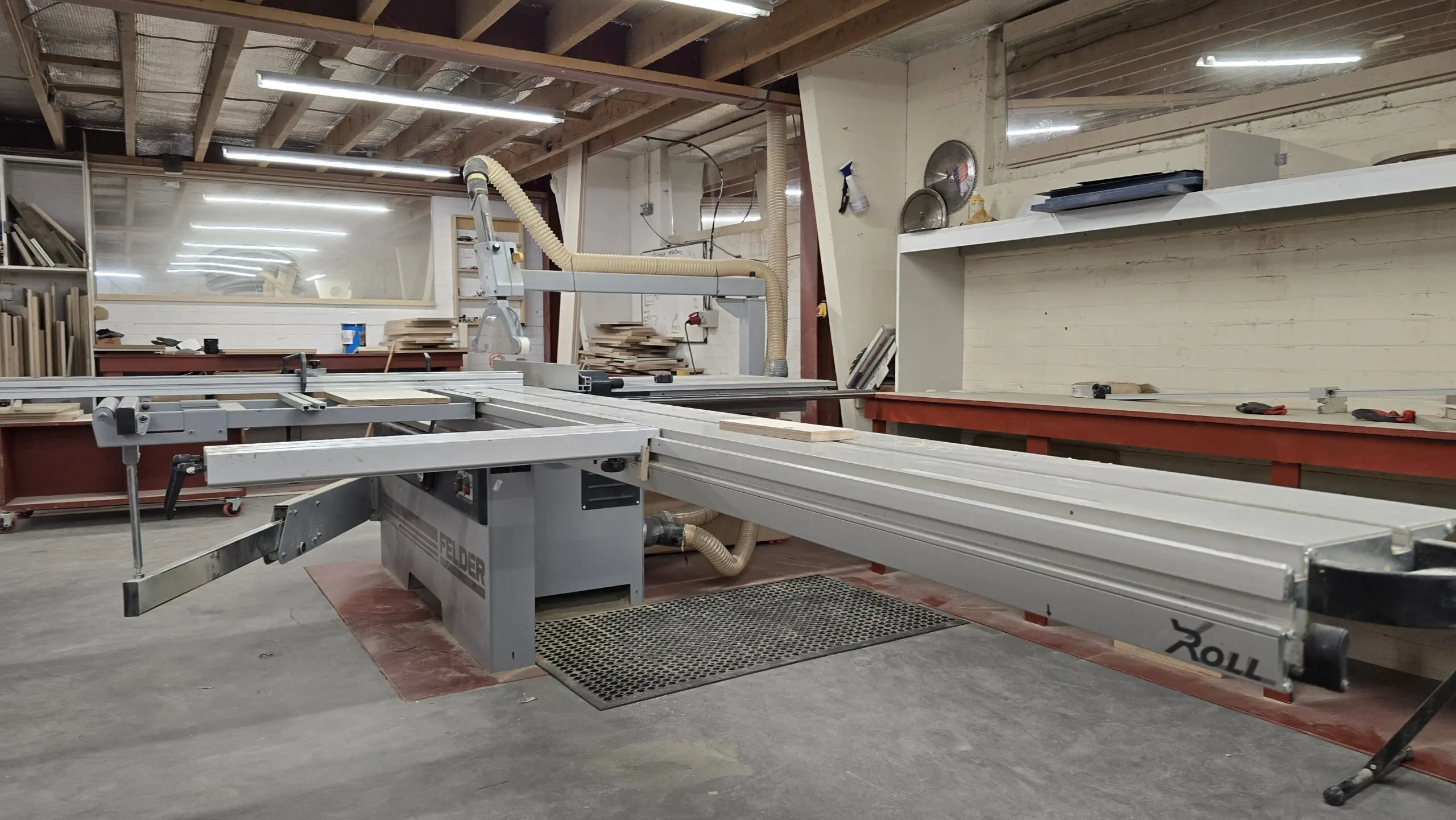 Felder sliding table panel saw and workbenches inside the JS DECO Wakefield workshop