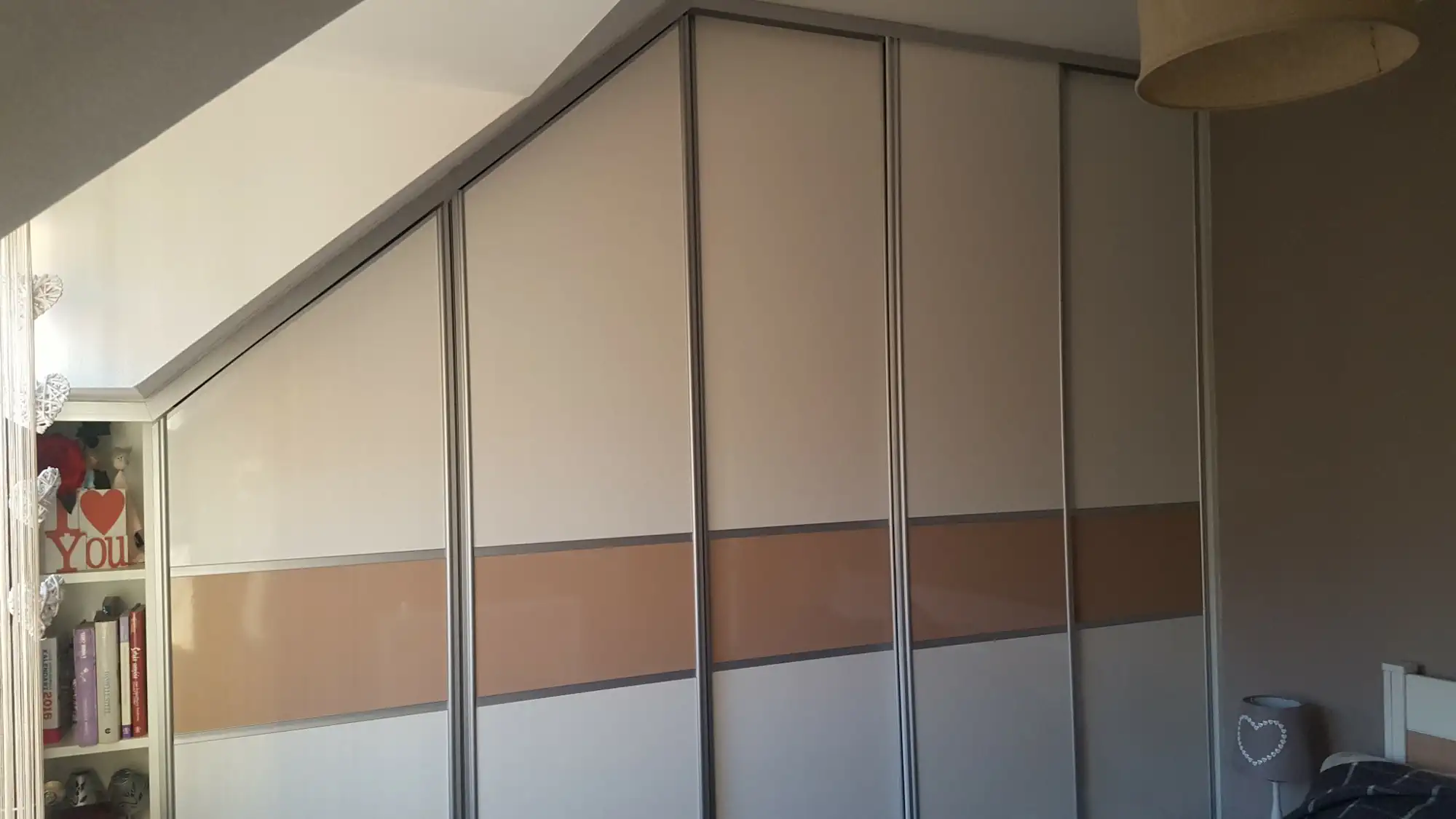 Bespoke sliding door wardrobe under slopped ceiling Sliding door wardrobe with sliding doors under ceiling