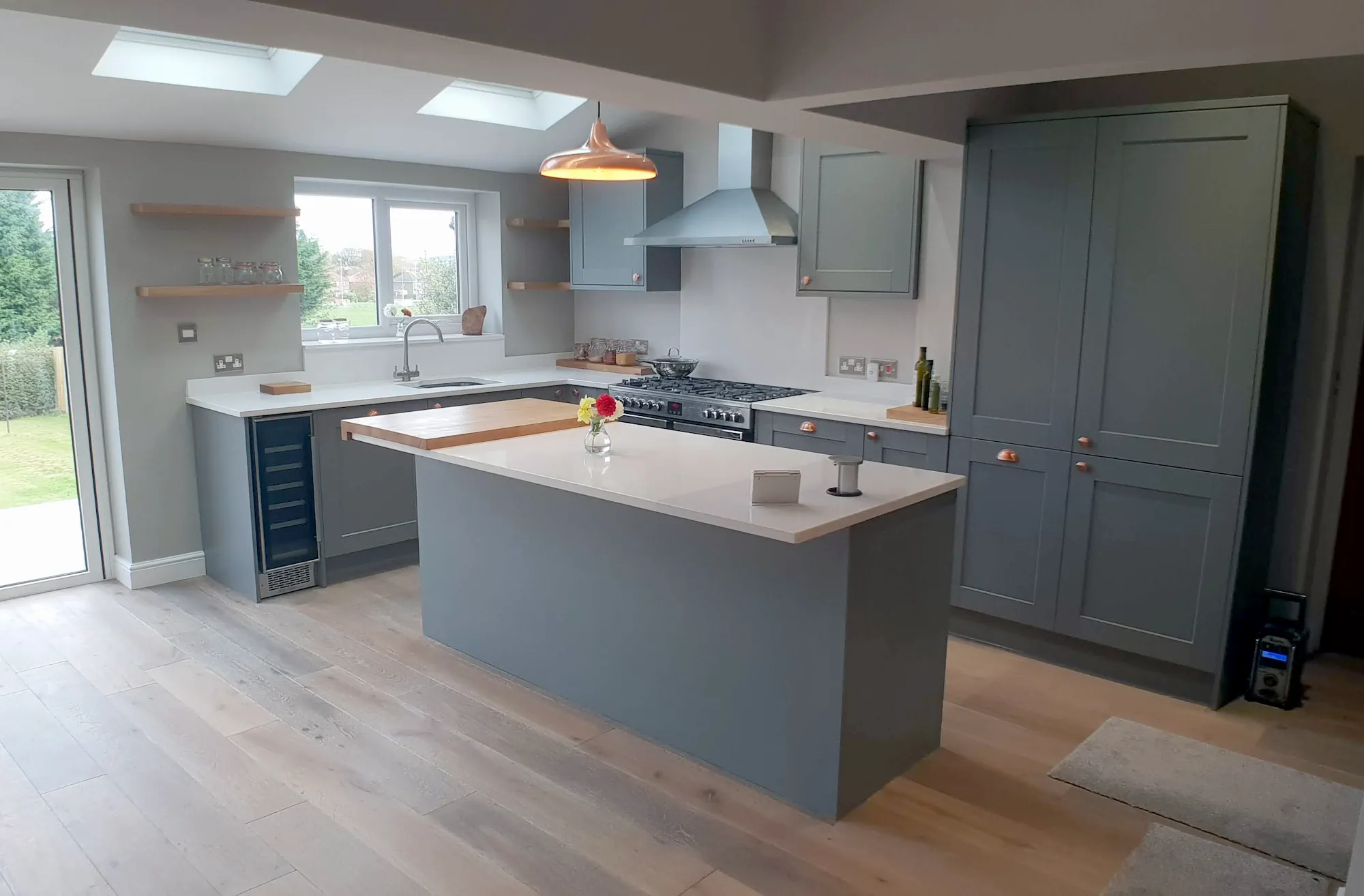 Kitchen extension shaker style island with quartz worktop and solid oak board