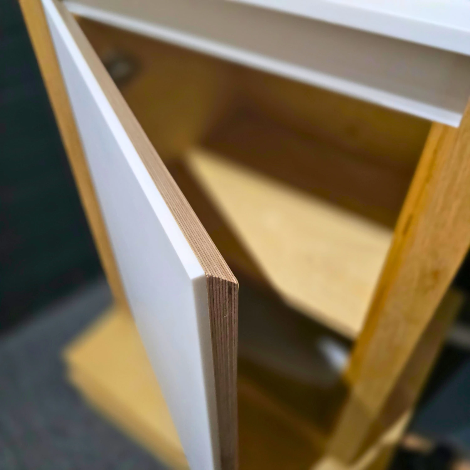 Sample of corian aplication on the plywood doors to achive consistent finish.