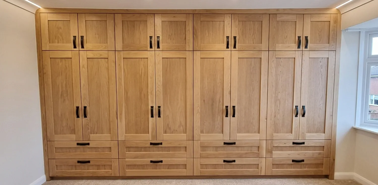 Stylish solid oak wardrobe with multiple shaker style doors