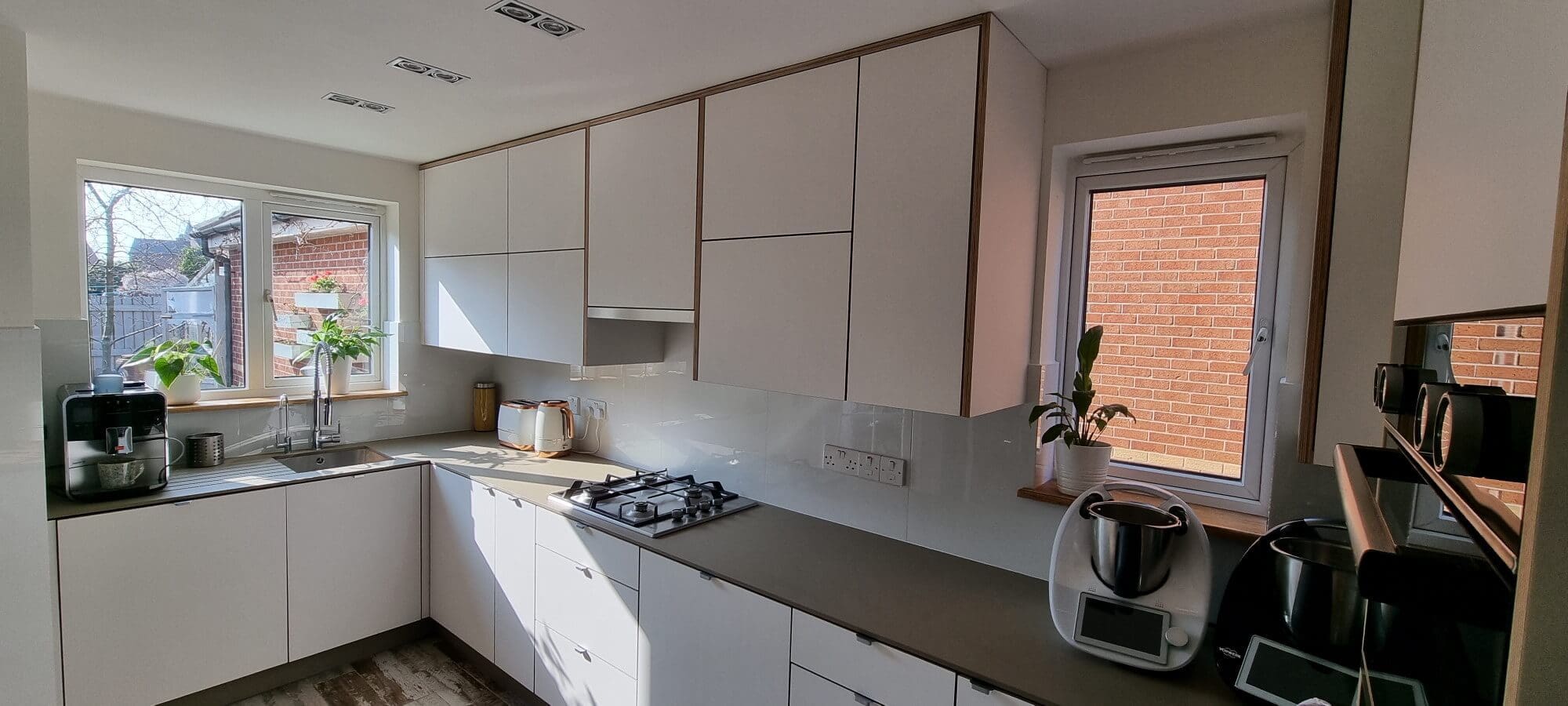 White Modern Fenix NTM Plywood Kitchen | Custom Made Furniture