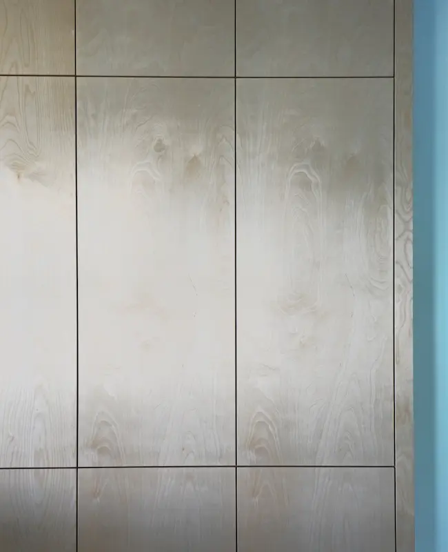 Grain matched plywood kitchen and wardrobe doors with continuous grain pattern by JS DECO premium birch plywood kitchens UK
