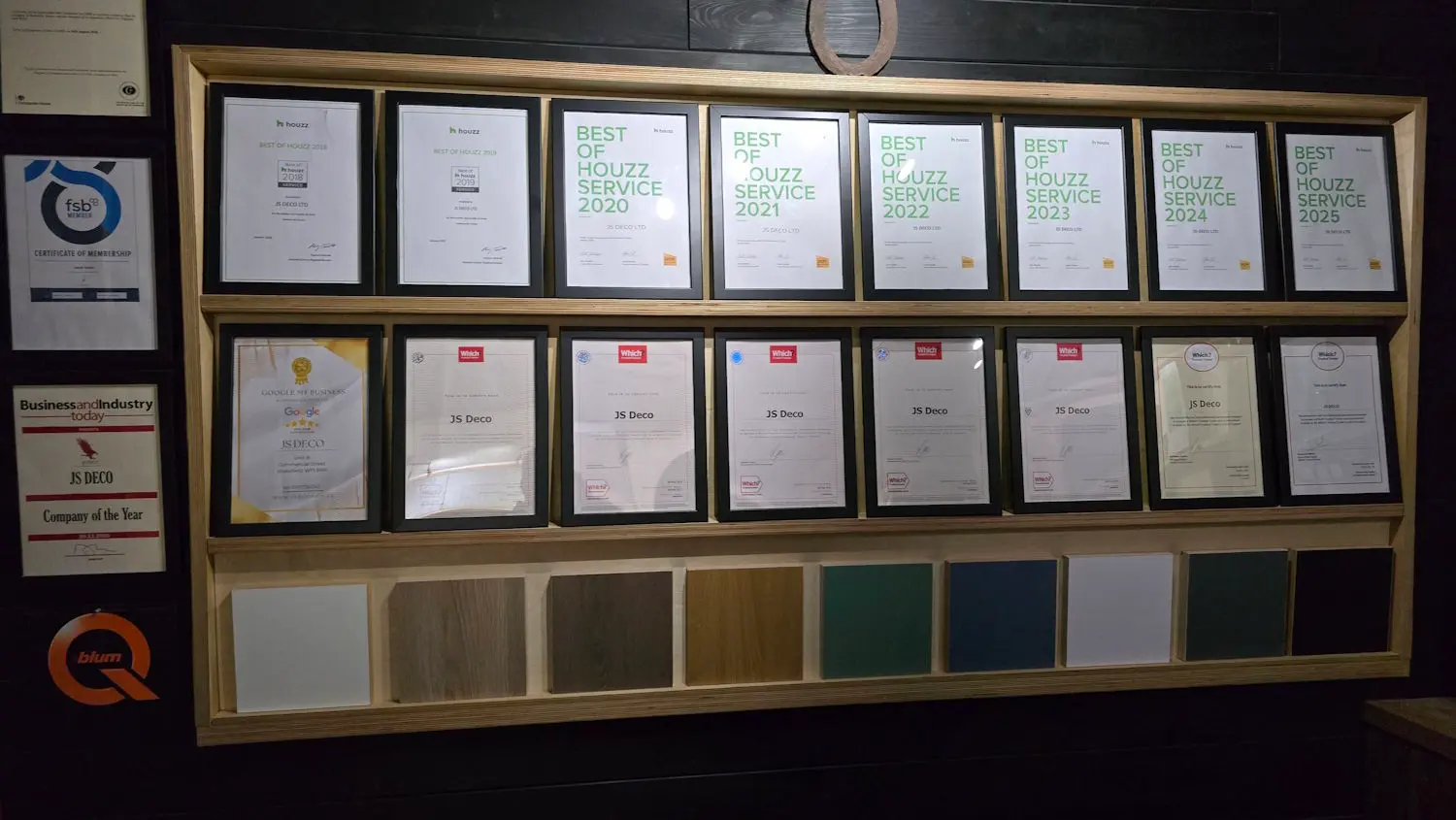 JS DECO awards wall featuring Houzz Best of Service certificates and Which? Trusted Trader accreditations in Wakefield