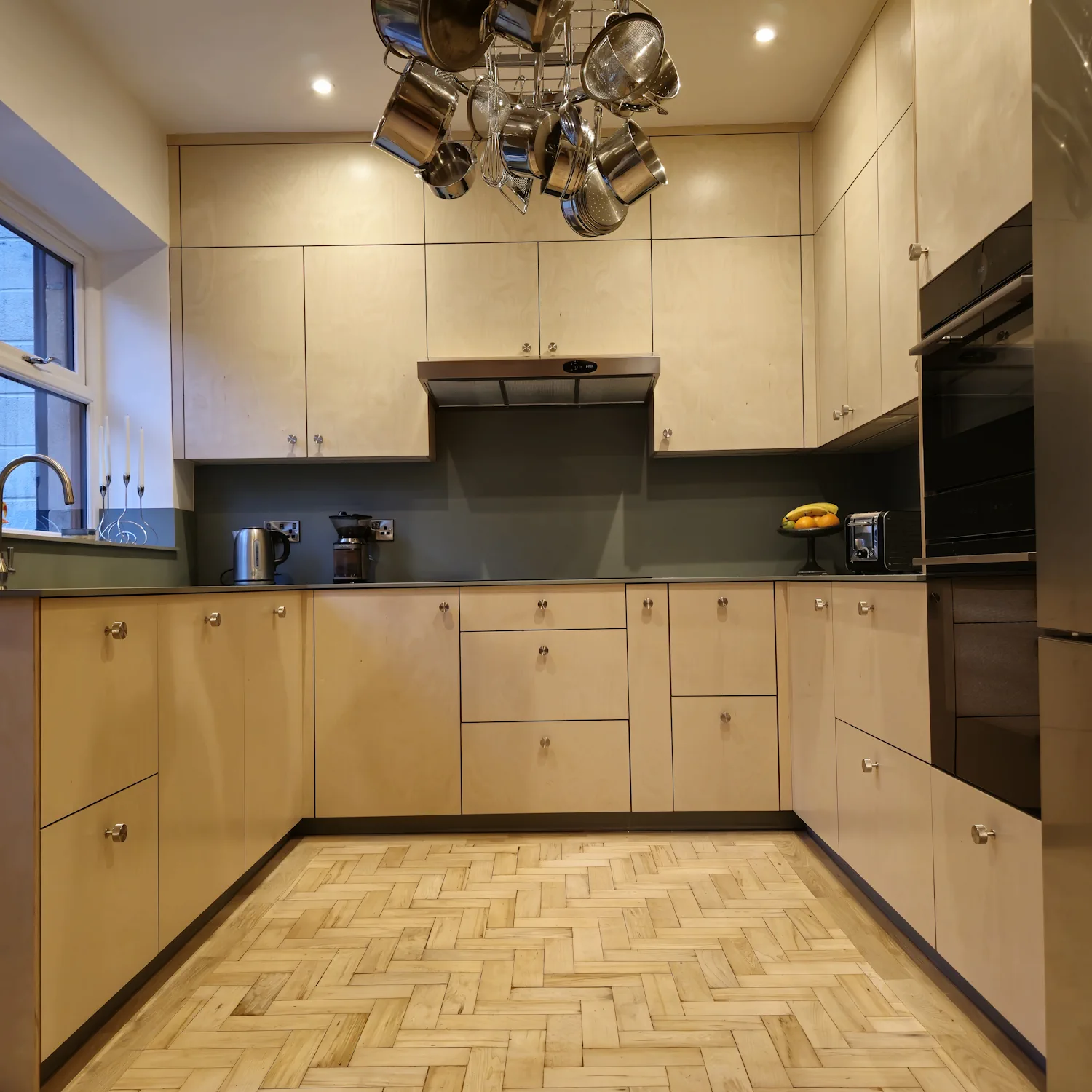 Full-height bespoke plywood kitchen cabinets in Matlock Full height bespoke plywood kitchen cabinets with integrated double oven and fridge in Matlock Derbyshire home