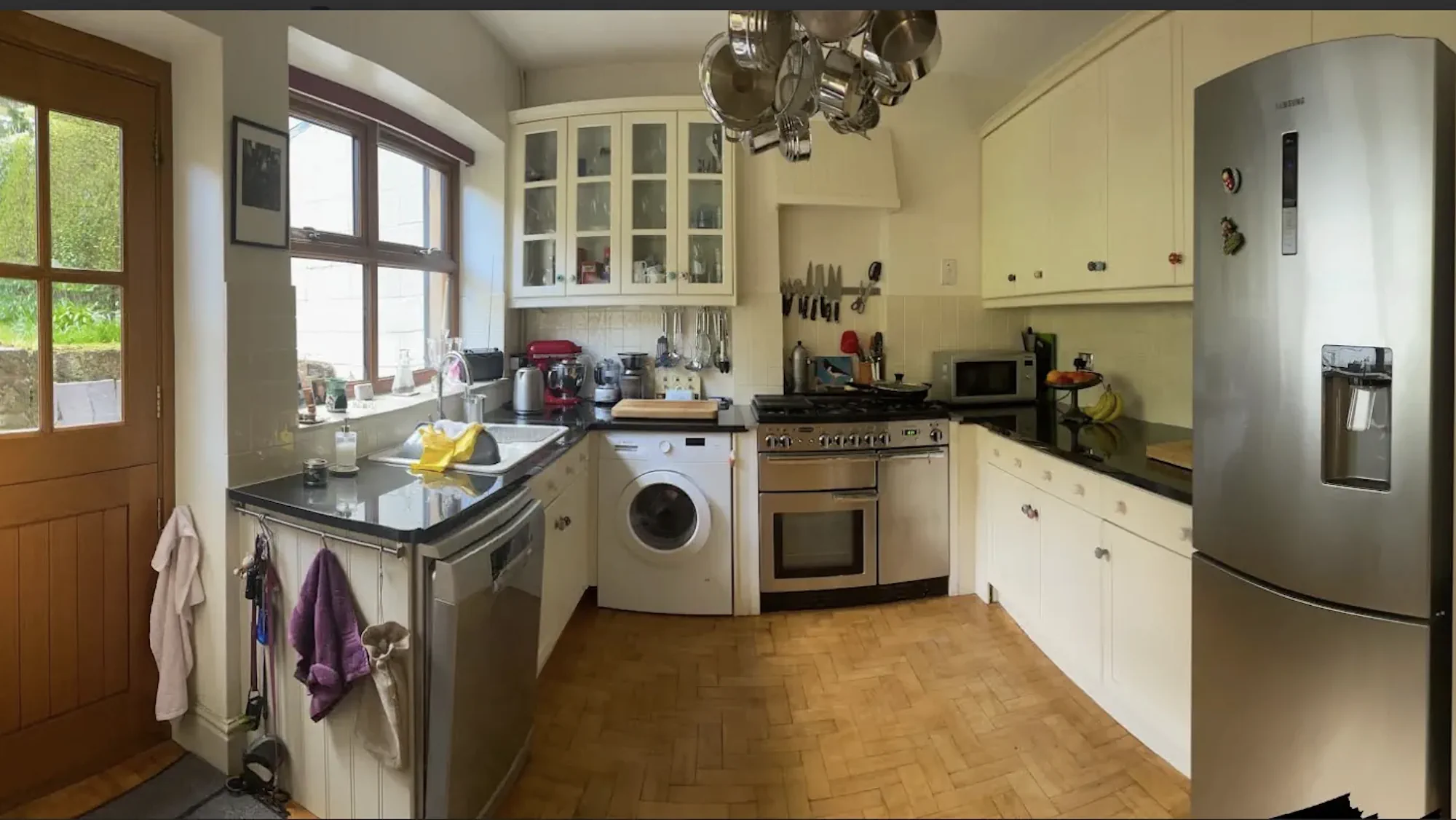 Front elevation render of plywood kitchen with green splashback Front elevation render of plywood kitchen with full height cabinets and green splashback in Matlock Derbyshire