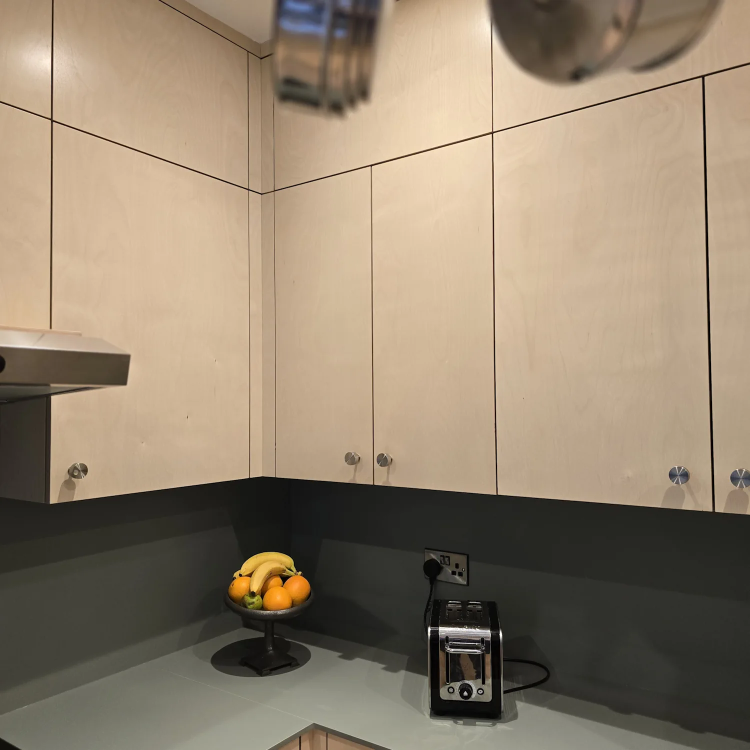 Corner plywood kitchen cabinets with magic corner storage Corner plywood kitchen cabinets with FENIX worktop and magic corner storage in modern Matlock Derbyshire kitchen