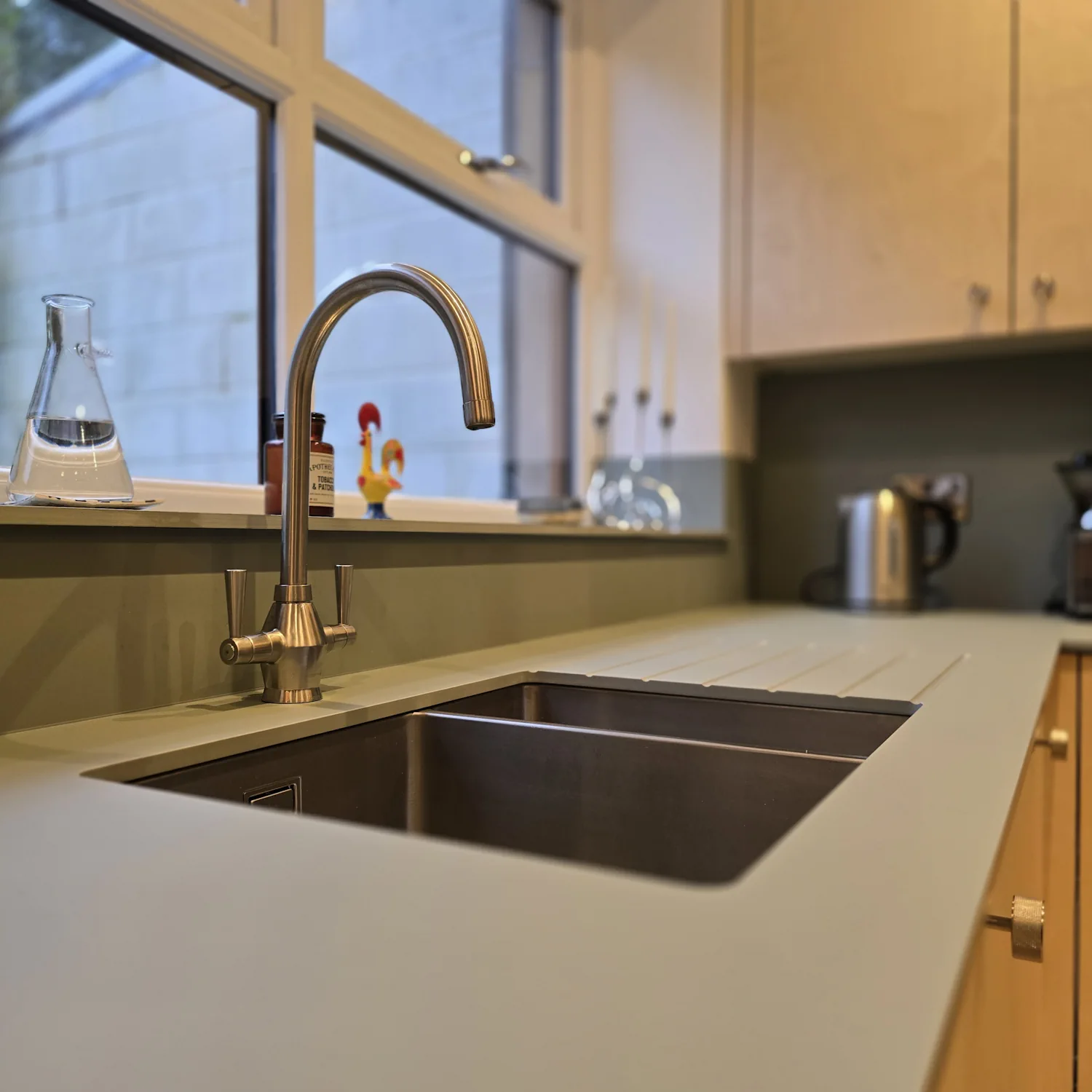 Plywood kitchen sink run with FENIX drainer in Matlock Plywood kitchen sink run with FENIX Verde Brac drainer grooves and brushed steel tap in Matlock Derbyshire kitchen