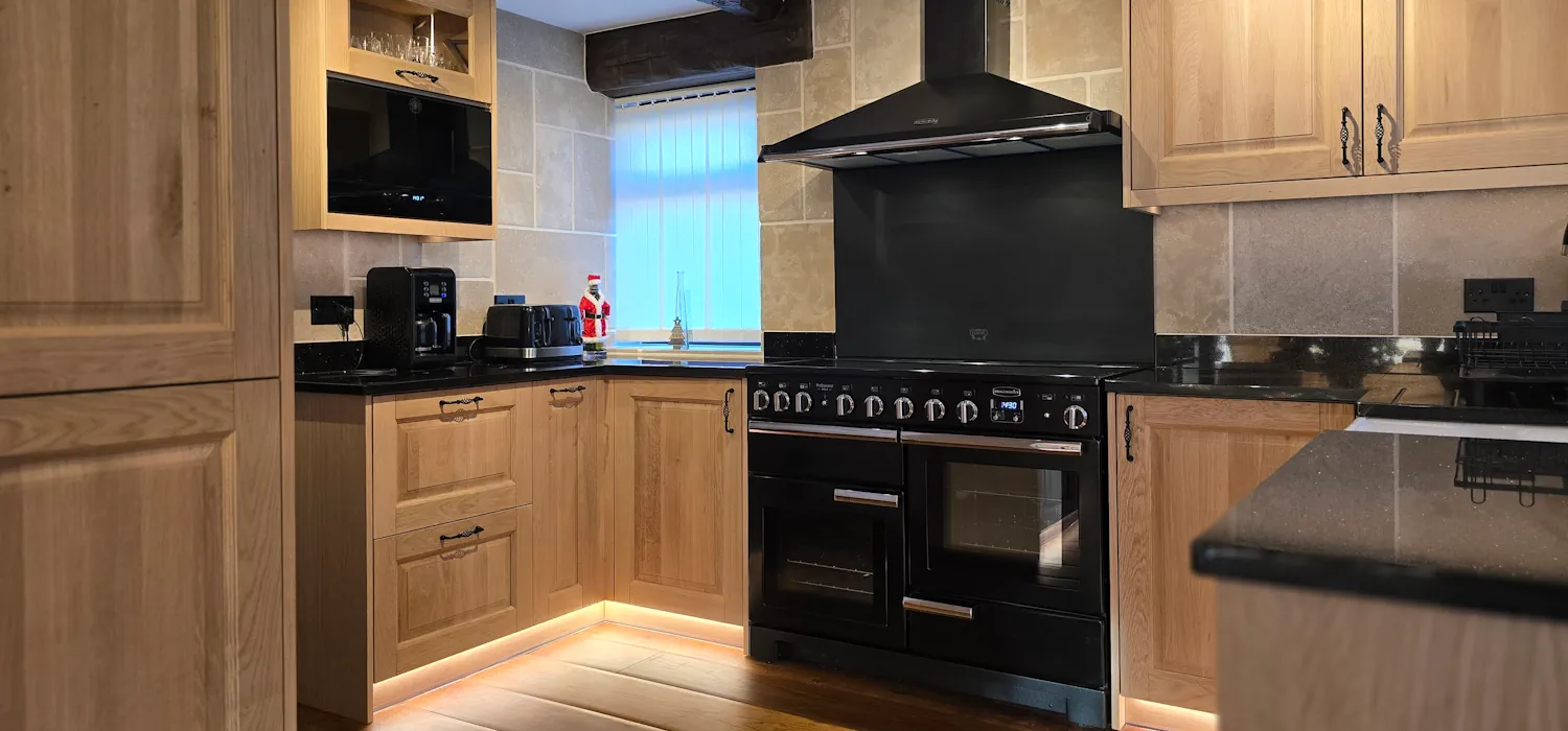 Solid oak elements combined with birch plywood cabinetry