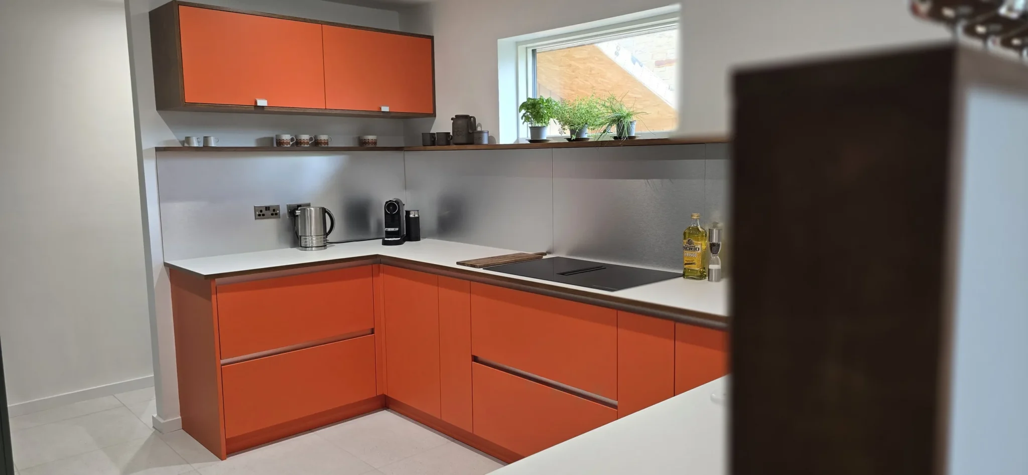 A further view of the finished working run, wall cabinet and window shelf.